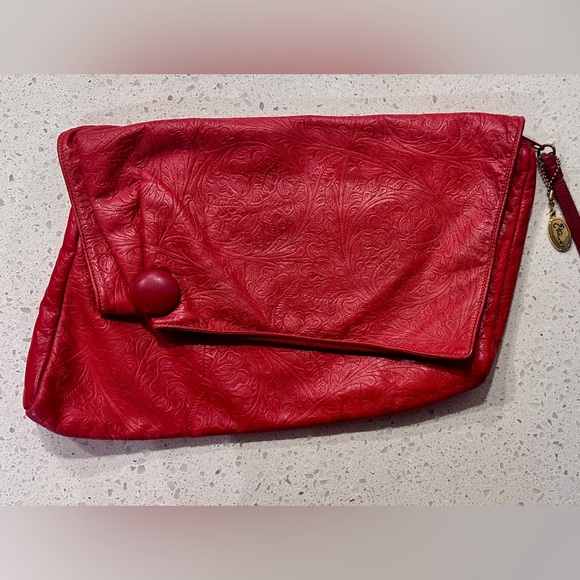 Vintage Handbags - Vintage Etra embossed leather red clutch.